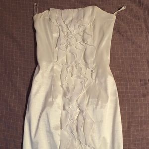 Strapless white mini dress with ruffles